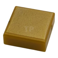 LEGO Carreau 1 x 1 avec motif de surface or métallique.