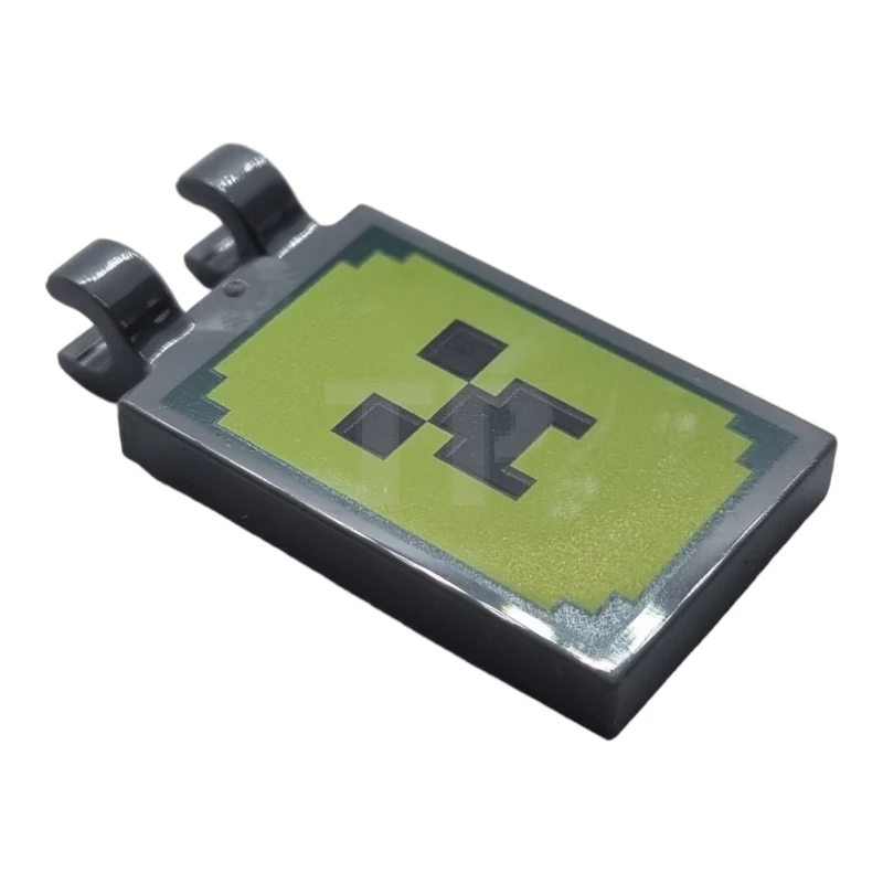 LEGO&reg; 6331693 - 30350bpb098 - Carreau, modifié 2 x 3 avec 2 clips avec visage pixelisé noir sur motif de fond vert et citron vert (Minecraft).
