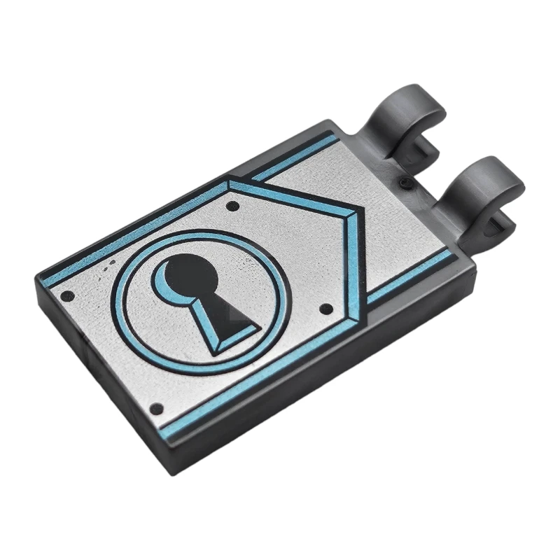 LEGO&reg; 6288536 - 30350bpb103 - Tile, Modified 2 x 3 with 2 Clips with Silver Clasp and Key Hole Pattern