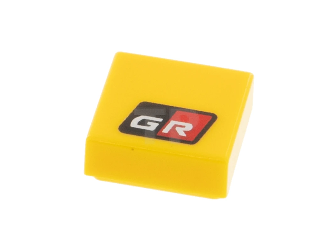 LEGO&reg; 6323896 - 3070pb220 - Tile 1 x 1 with Groove with Silver 'GR' on Black and Red Background Pattern