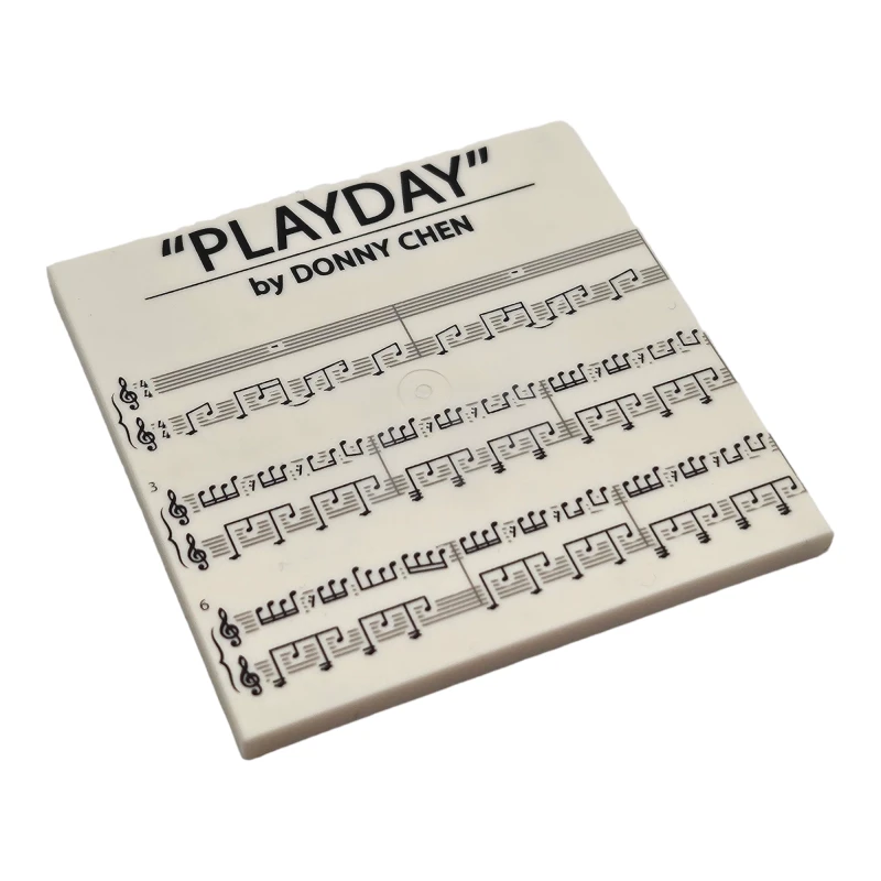 LEGO&reg; 6335907 - 10202pb016 - Tile 6 x 6 with Bottom Tubes with 'PLAYDAY', 'by DONNY CHEN' and Music Notes Pattern