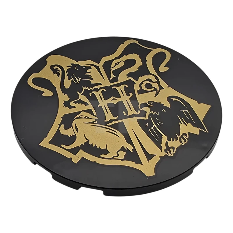 LEGO&reg; 6578911 - 7212pb004 - Tile, Round 6 x 6 with Gold Hogwarts Crest Pattern