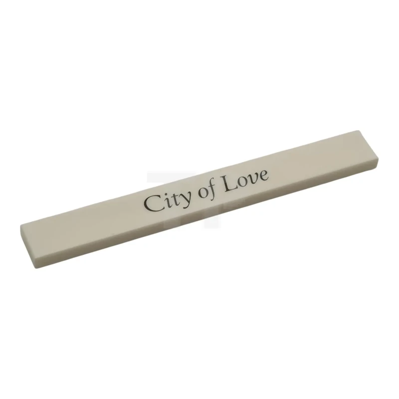 LEGO&reg; 6576392 - 4162pb334 - Tile 1 x 8 with Black 'City of Love' Pattern