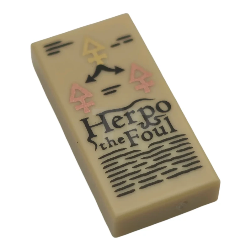 LEGO&reg; 6597976 - 3069pb1501 - Tile 1 x 2 with Book Page with Black Text and 'Herpo the Foul' and Gold and Copper Arcane Symbols Pattern