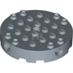 Brique, ronde 6 x 6 avec 4 trous pour les pins latéraux et un trou central.